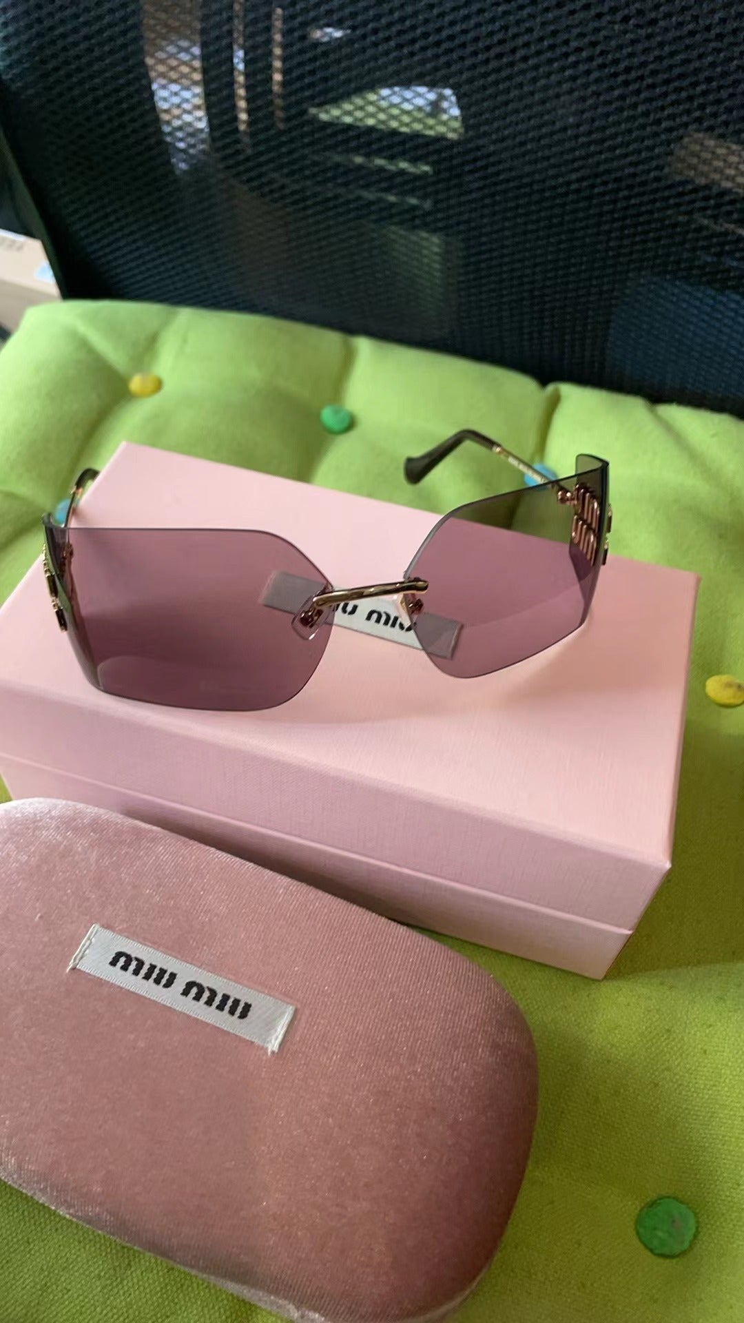 Men's and women's accessories sunglasses Miu