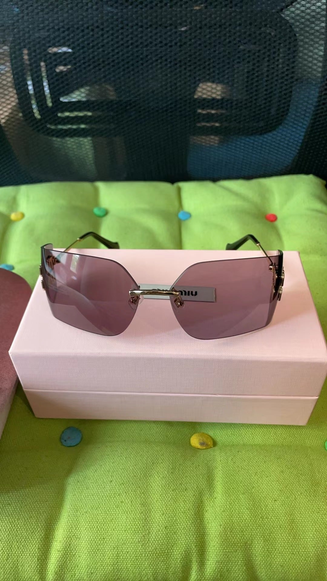 Men's and women's accessories sunglasses Miu