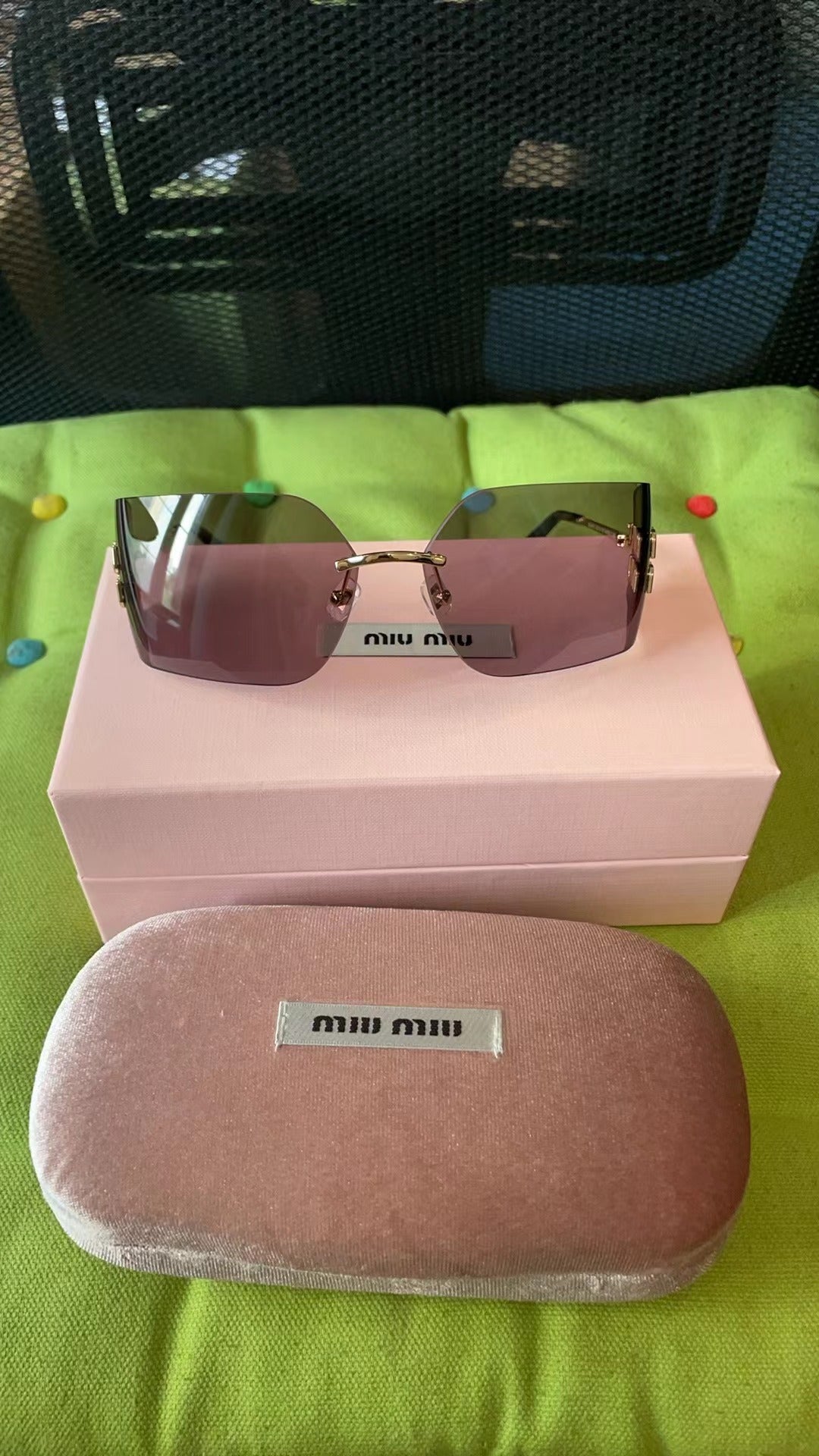 Men's and women's accessories sunglasses Miu