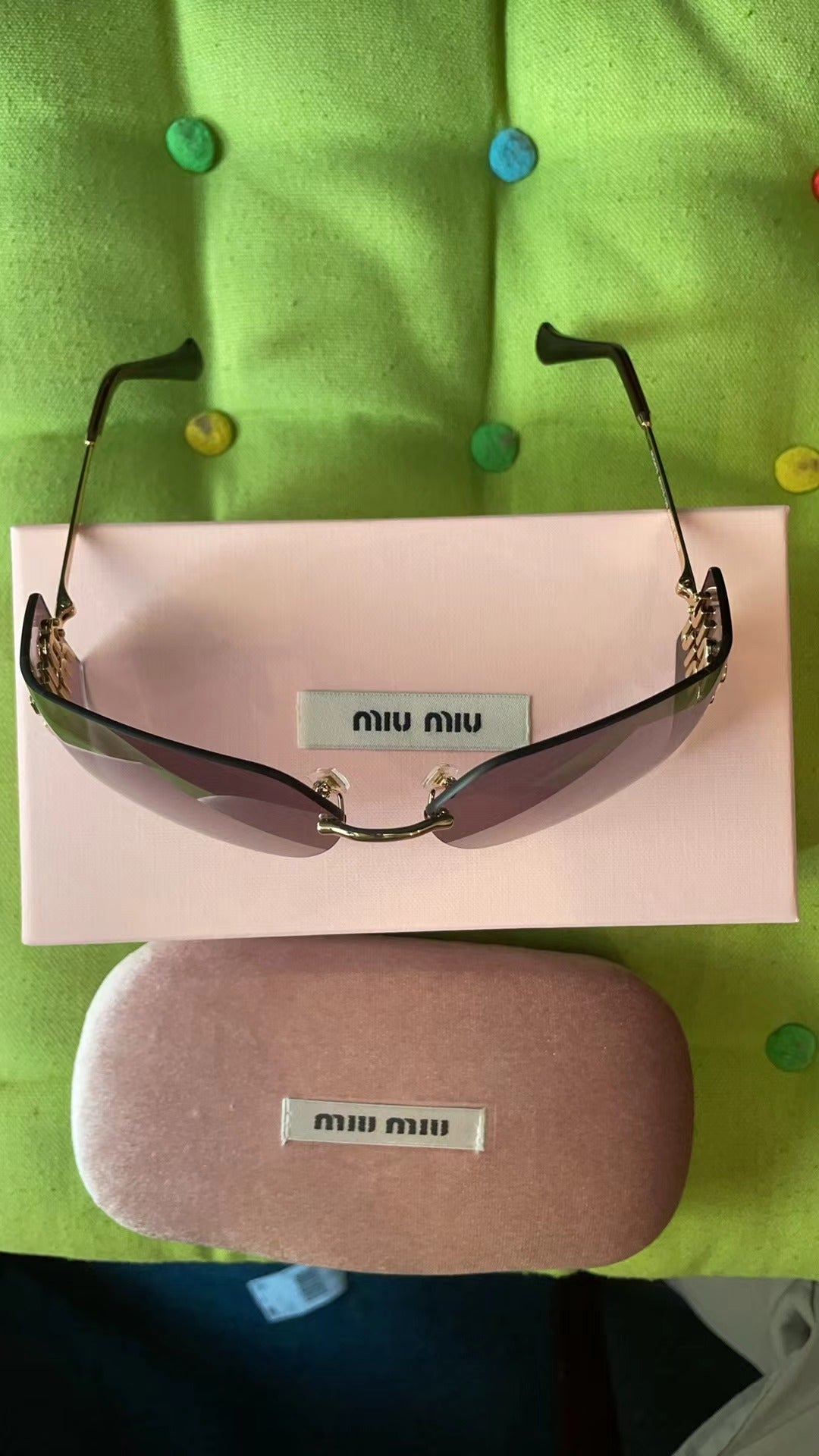 Men's and women's accessories sunglasses Miu