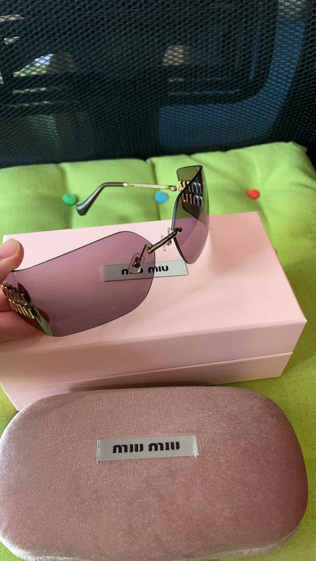 Men's and women's accessories sunglasses Miu